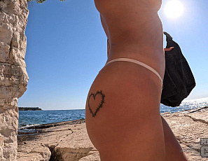 081026_dora_is_very_tanned_and_filming_herself_on_a_nude_beach_while_on_vacation_in_croatia