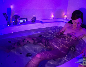 112524_candle_lit_hot_tub_masturbation_pretty_bleika_jills_with_a_dildo_underwater